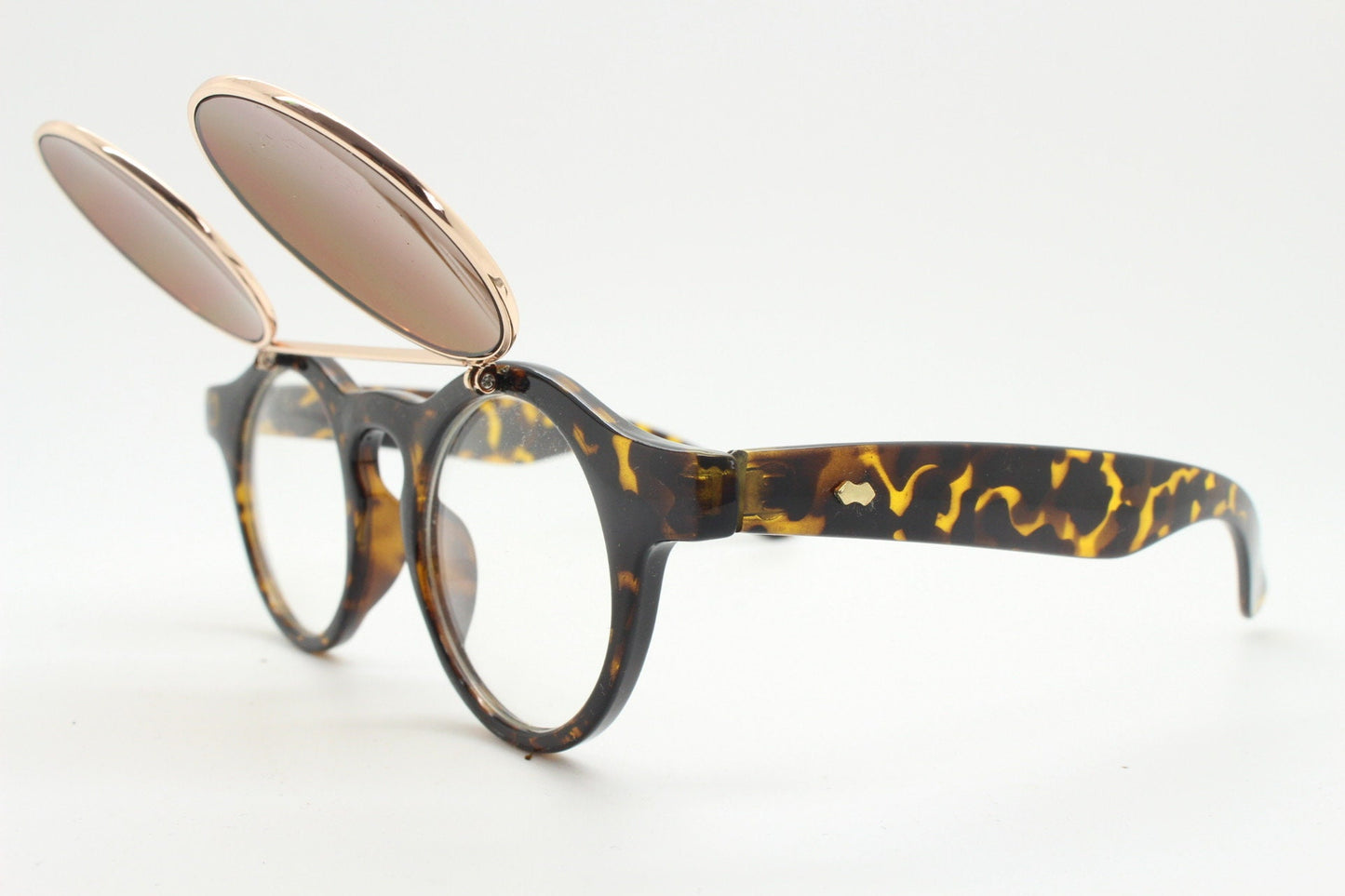 Vintage 90s round flipper sunglasses. 30s style tortoise frame with clear lenses and flip up sunglasses visor. BNWT unused