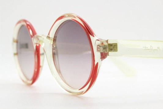 Mary Quant 60s vintage round sunglasses made in France. Yellow crystal transparent lucite frame in with contrasting dark graduating lenses