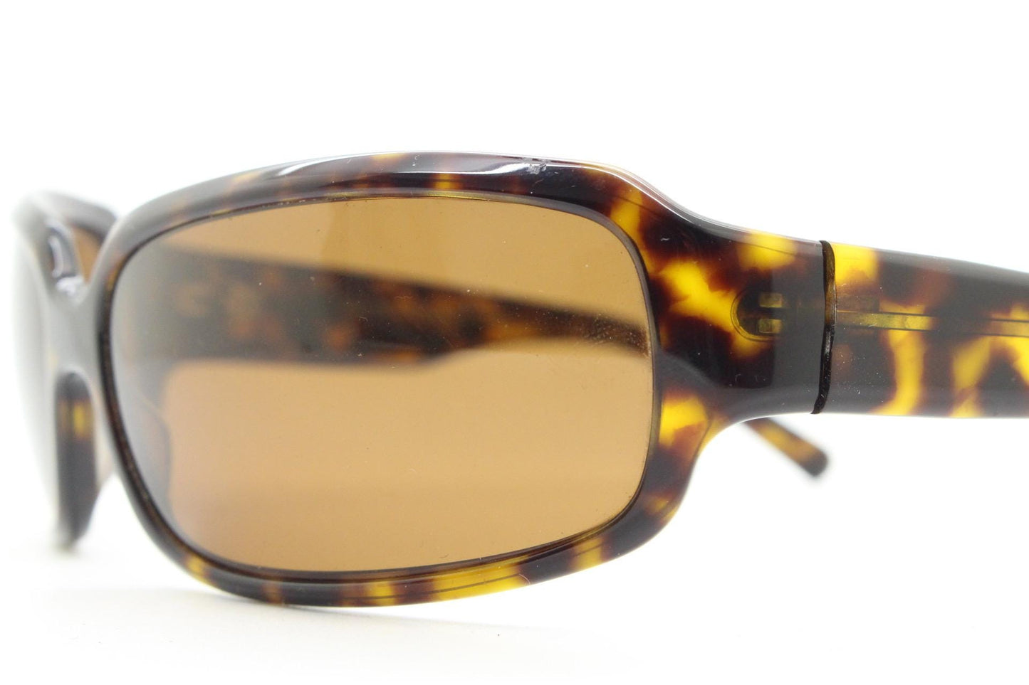 Oliver Peoples vintage Y2K wrap around sunglasses model Impala made in Japan. Curved bug eye in mottled brown tortoise acetate