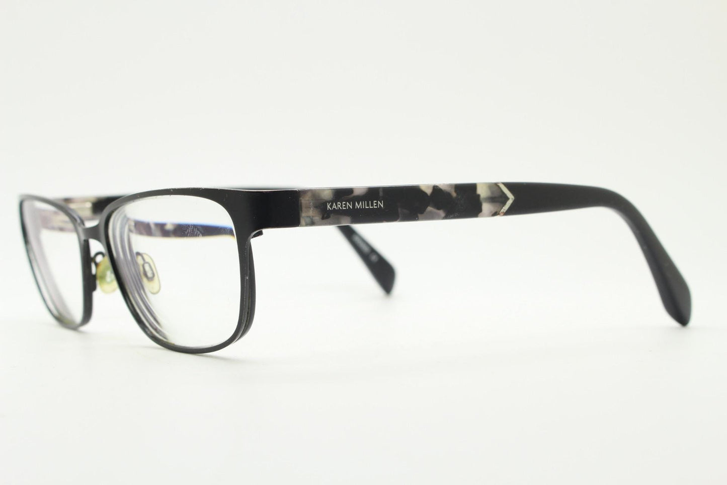 Karen Millen vintage rectangular cat eye glasses. Black satin finish metal front with grey marbled arms. Optical frames. Womens prescription