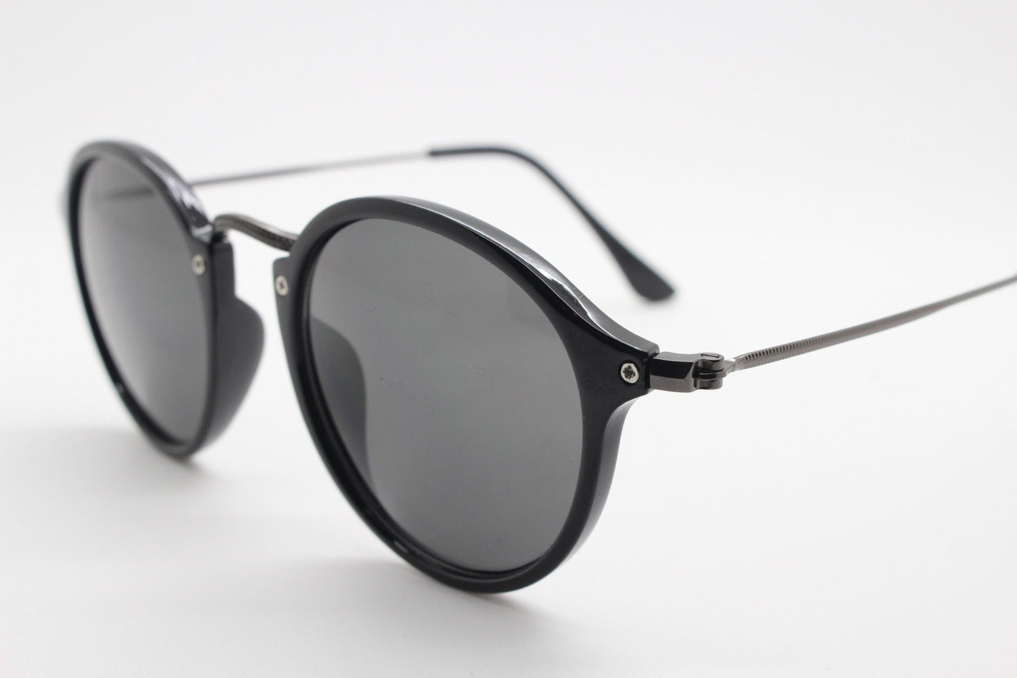 90s vintage round sunglasses. Black gloss slim 30s 40s design frame with metal bridge and dark lenses. Unused NOS