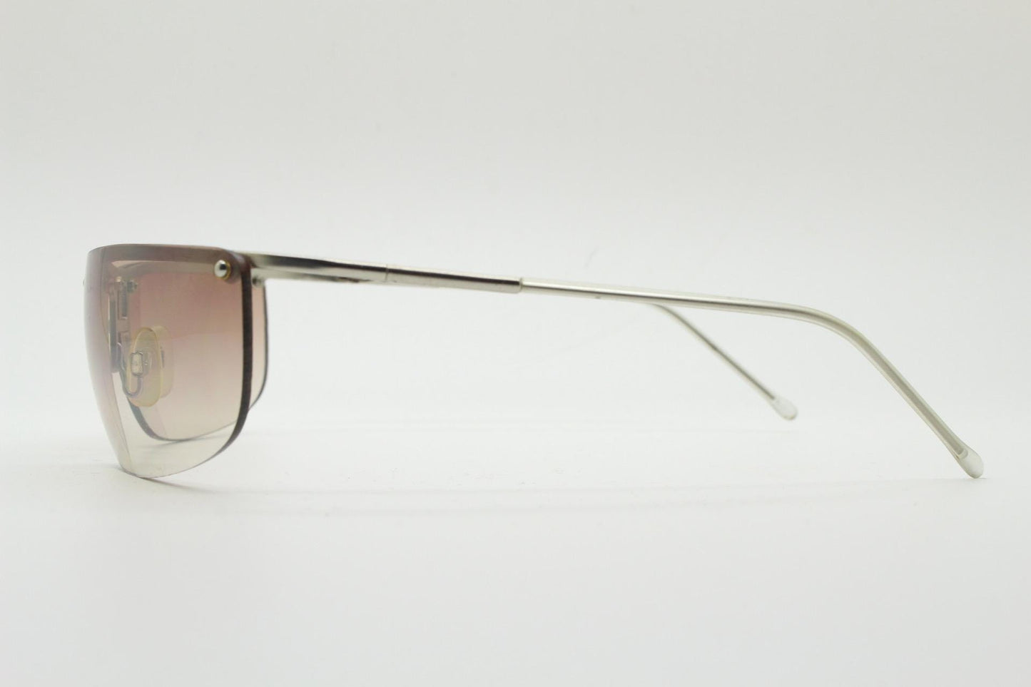 Y2K vintage visor sunglasses. Flat top half frame wraparound shield design with light tone graduating curved lenses. 2000's. NOS