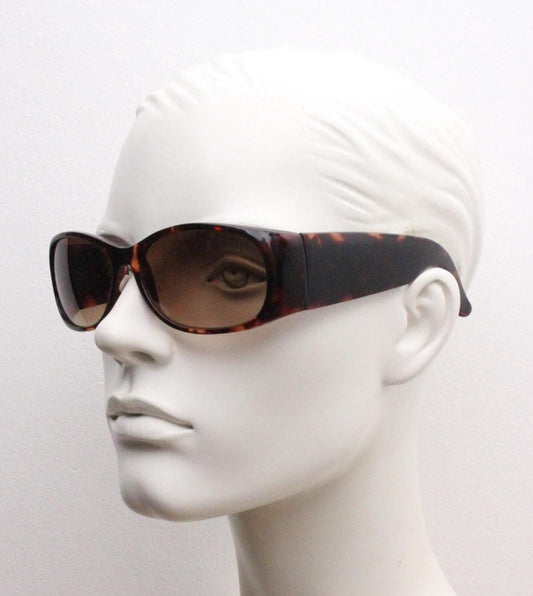 Y2k vintage wrap around bug eye sunglasses. Aerodynamic 60s design tortoise frame with full height arms in excellent proportions. 2000's NOS