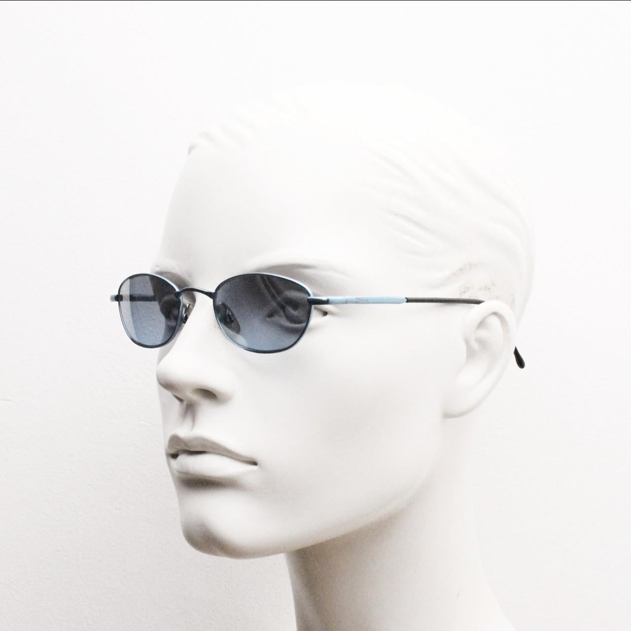 90s vintage small oval sunglasses by X-line. Unusual blue chrome metal frame with well matched mirror lenses. Quality NOS