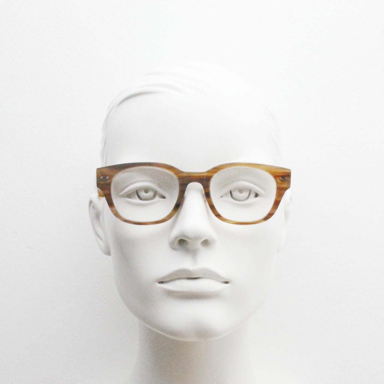 Thick frame rectangular eye glasses. Superior quality transparent brown gloss acetate optical frames with beige arms.  Prescription vintage