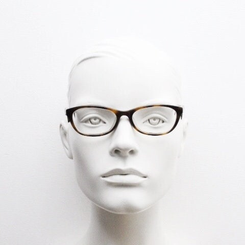 Calvin Klein Jeans modified cat eye glasses model CKJ918. Tortoise gloss low profile acetate optical frames. Prescription eyeglasses. RX