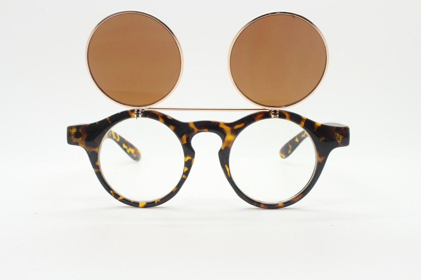Vintage 90s round flipper sunglasses. 30s style tortoise frame with clear lenses and flip up sunglasses visor. BNWT unused