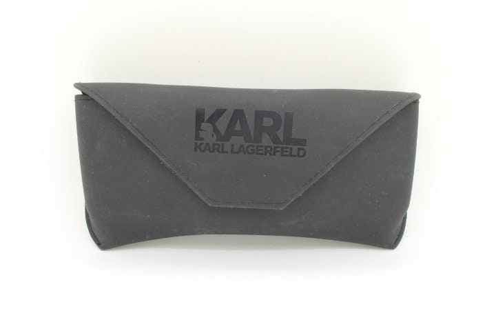 Karl Lagerfeld squared wayfarer shape eye glasses. Navy check pattern arms with satin finish brow optical frames. Prescription eyeglasses.