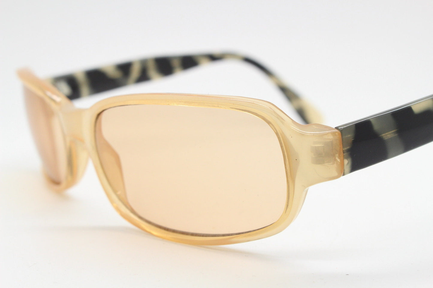 Y2K vintage curved rectangular sunglasses. Beige frame with matching lenses and contrasting tortoise arms. 2000s unused NOS. 00s
