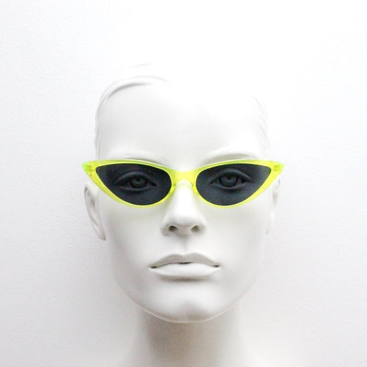 Y2K vintage extreme pointed cat eye sunglasses. Stylised yellow transparent frame with black lenses. Womens 50s style psychabilly. NOS