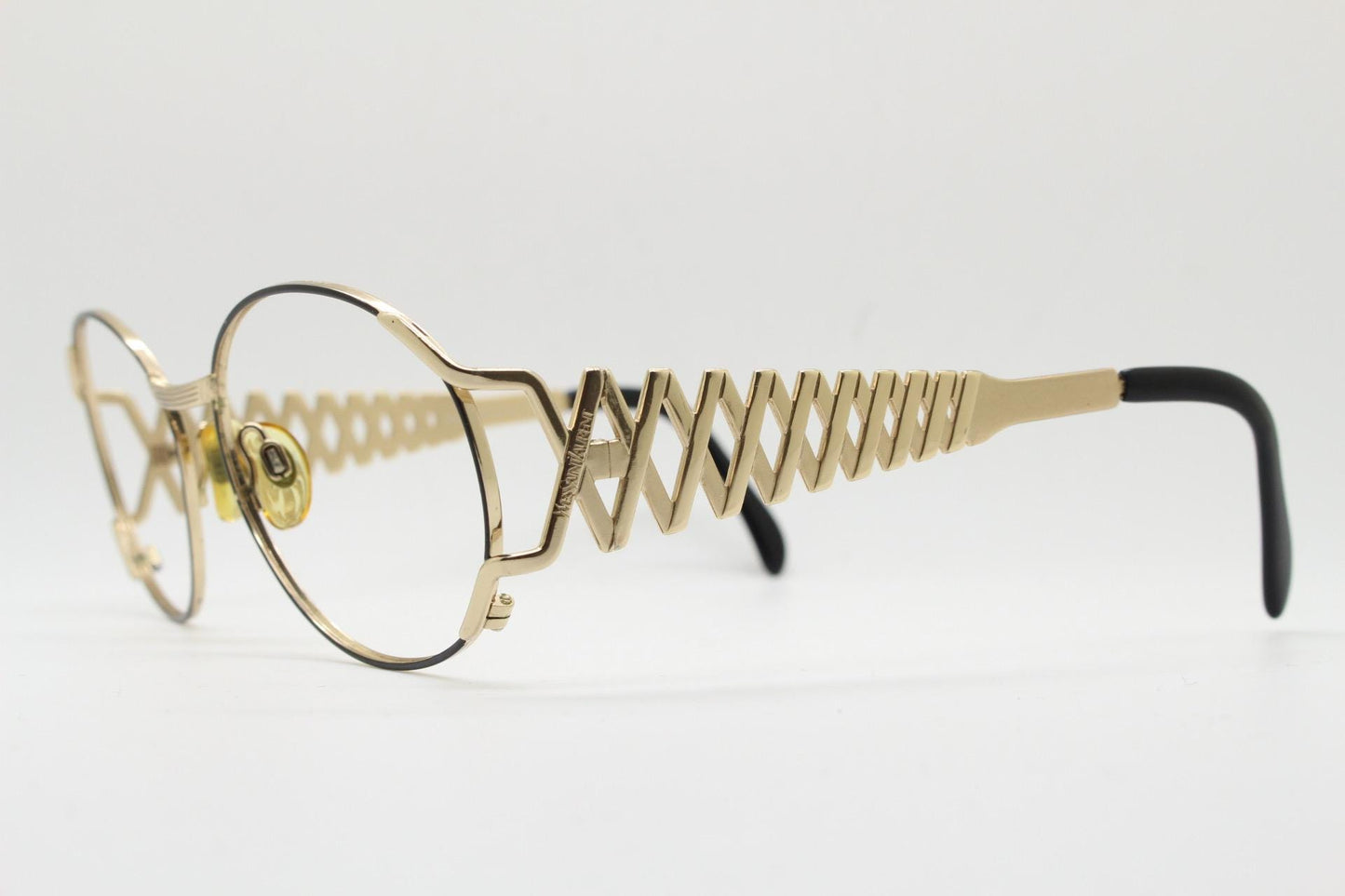 Yves Saint laurent 90s vintage large oval eye glasses made in Italy with incredible zig zag arm design. YSL Prescription RX spectacles