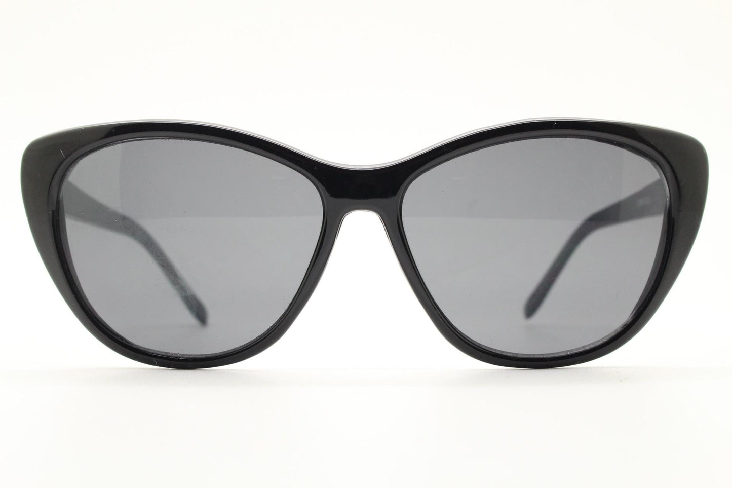 Vintage Y2K oval cat eye sunglasses. Womens plain black cateye in slightly large proportions. Rockabilly pin up. 2000s NOS catseye