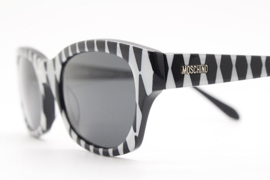 Moschino mind bending op art pattern cateye sunglasses made in Italy. Womens vintage monochrome acetate frame cat eye. 60s design. NOS