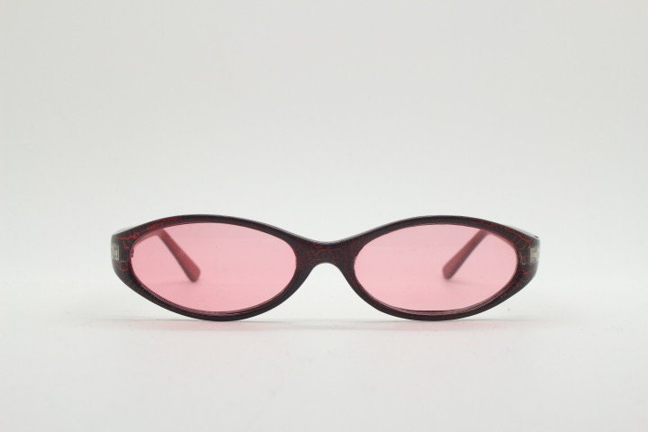 90s vintage abstract oval sunglasses. Thick curve around pink frame with psychedelic light pink lenses. Super villain mini mask. Cosplay NOS