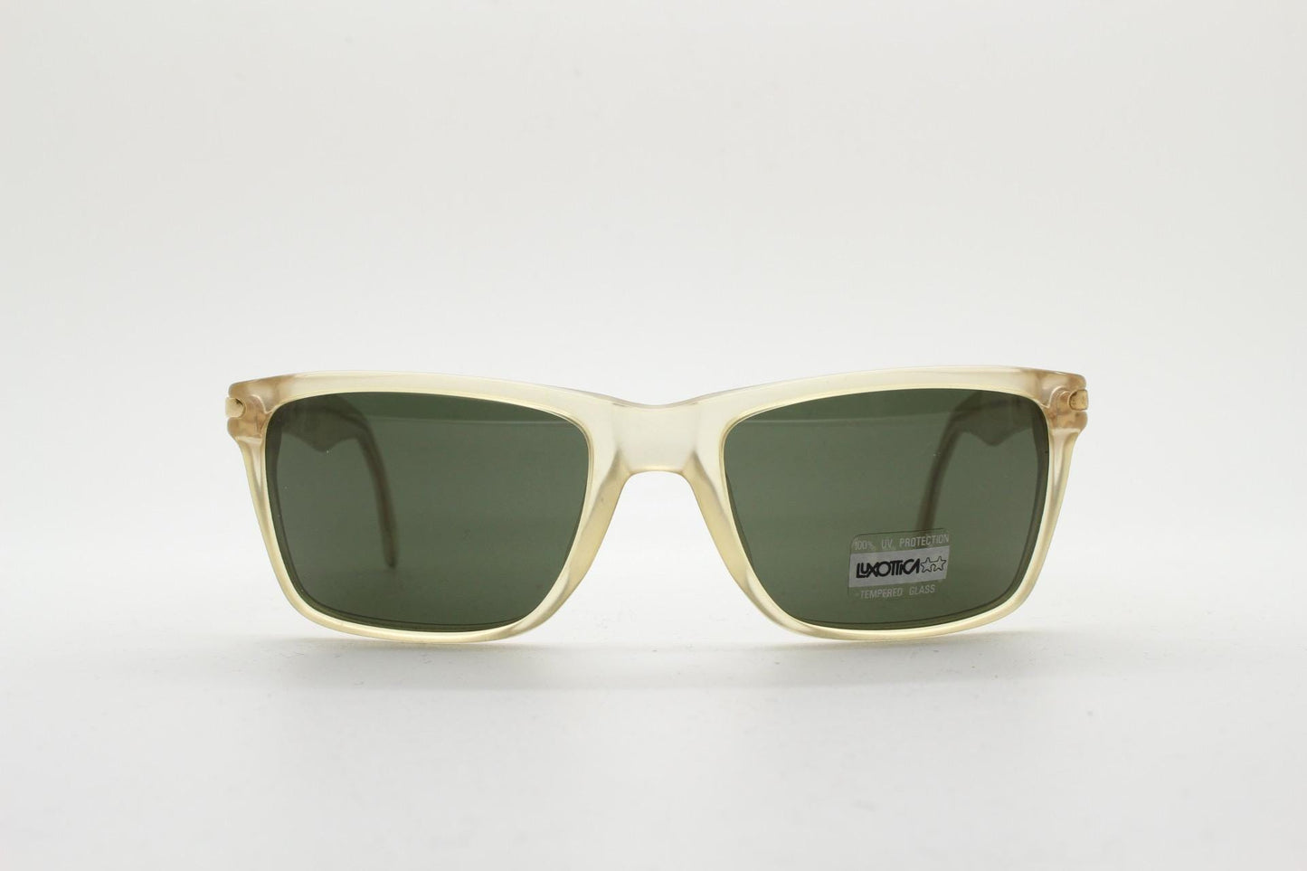 Luxottica 90s vintage rectangular sunglasses made in Italy. Transparent yellow acetate chunky frame with contrasting dark green lenses. BNWT