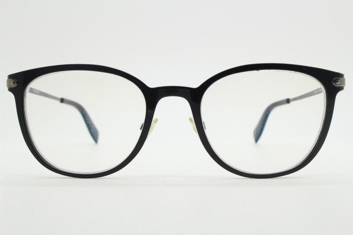 Trussardi modified cat eye glasses model VTR023. Womens flat black and gunmetal grey optical frame. Prescription. Vintage spectacles