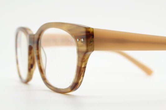 Thick frame rectangular eye glasses. Superior quality transparent brown gloss acetate optical frames with beige arms.  Prescription vintage