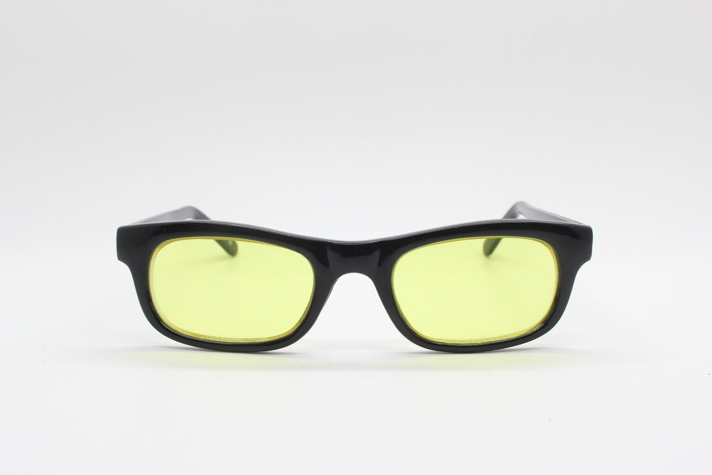 80s vintage rectangular sunglasses. Low profile slim black frame with psychedelic mod light tone canary yellow lenses. BNWT. NOS