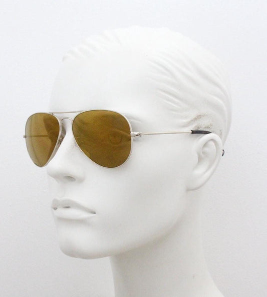 Michael Kors vintage aviator sunglasses. All time classic teardrop aviators in slim metal frame with gold mirror lenses. Hard case included