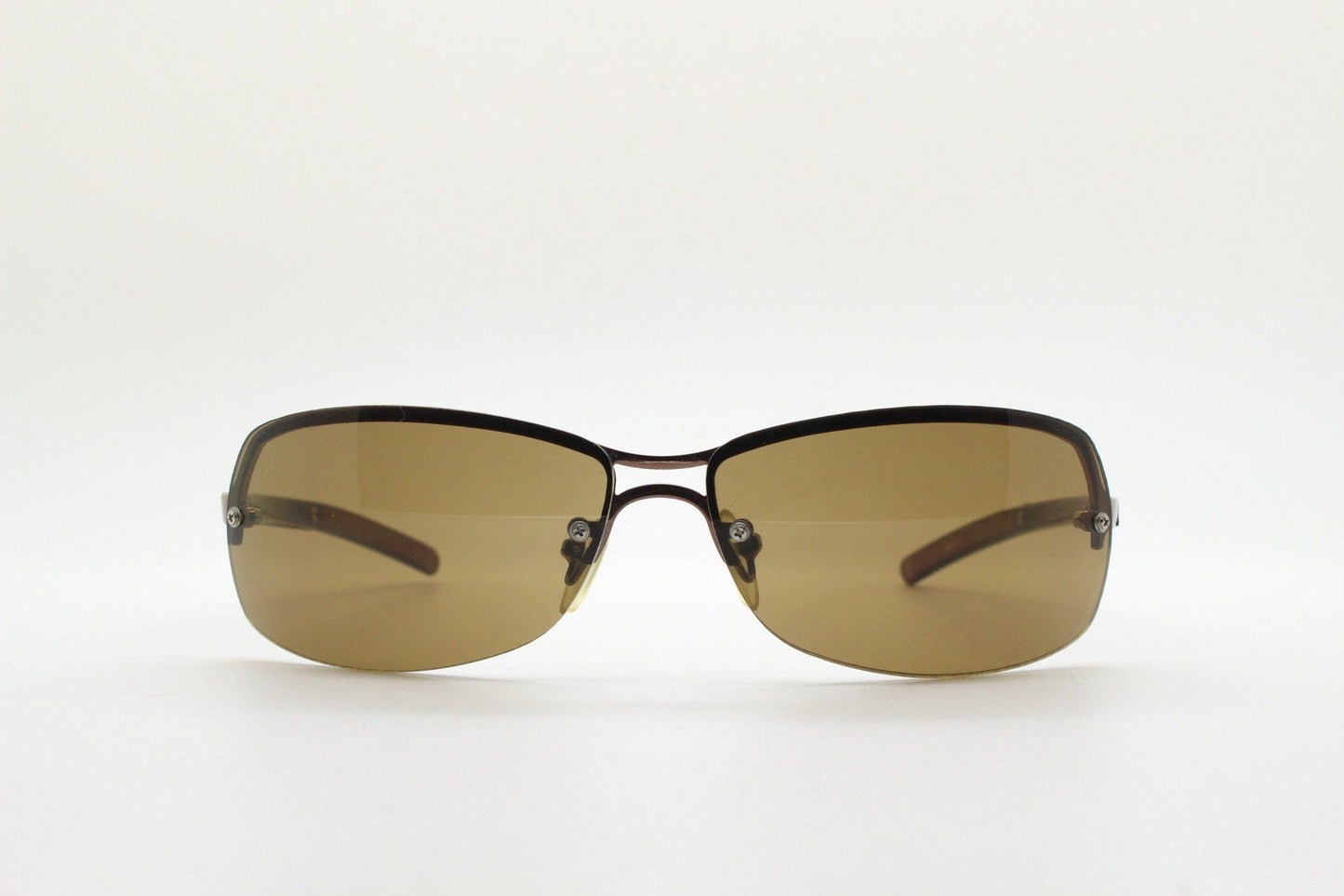 Y2K vintage modified small aviator sunglasses. Metallic brown chrome half frame with curved bug eye lenses and straight arms. 2000's. NOS