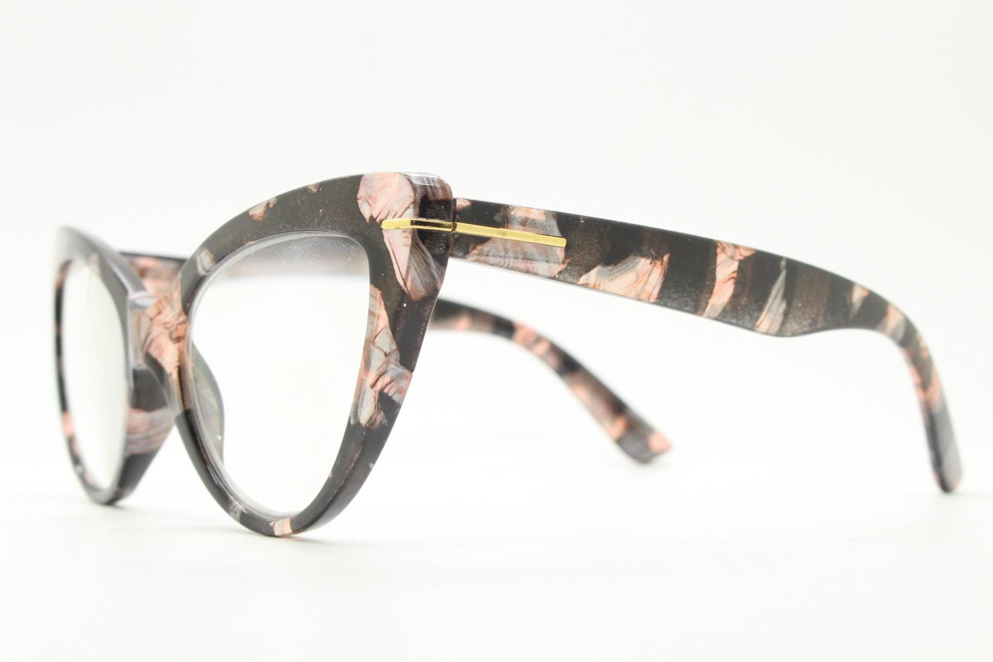 Dynamic pointed cat eye glasses. Transparent chunky cateye optical frame with pink and grey abstract pattern. Vintage Prescription RX