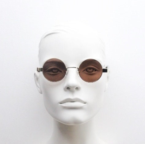 90s round vintage sunglasses. Gold 1920's style frame with tortoise arms and brown lenses. Unused. NOS. Steampunk