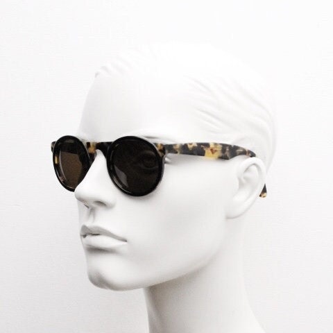 Francois Pinton Paris 90s vintage round sunglasses made in France. Womens thick acetate frame in honey tortoise brown tones. NOS