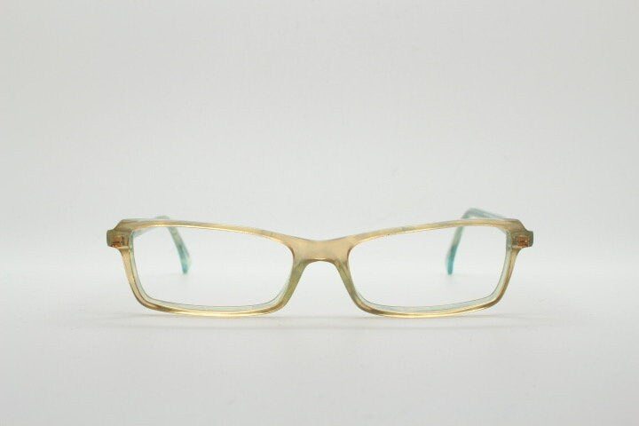 Alain Mikli rectangular eye glasses hand made in France. Low profile slim peach and blue transparent acetate optical frame. Prescription RX.