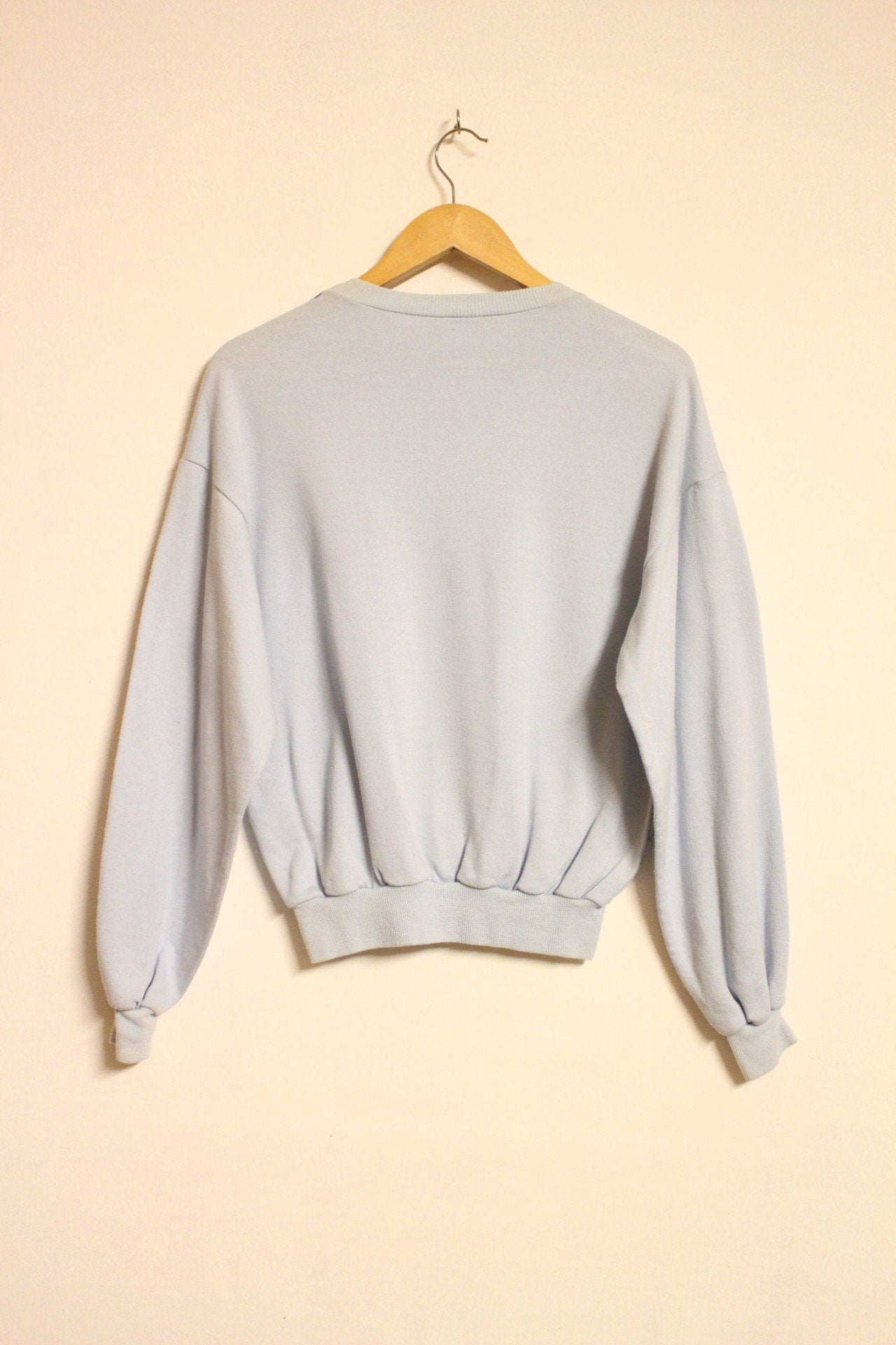 Vintage 80s blue sweatshirt by Lotto with 'art of colours' paint splash graphic. Made in Italy.