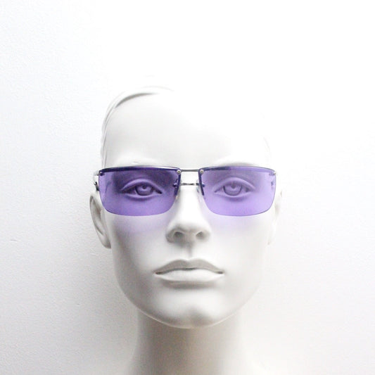 Y2K vintage purple shield sunglasses. 2000's half frame wraparound aerodynamic mini mask visor with curving lenses. 90s 00s unused NOS