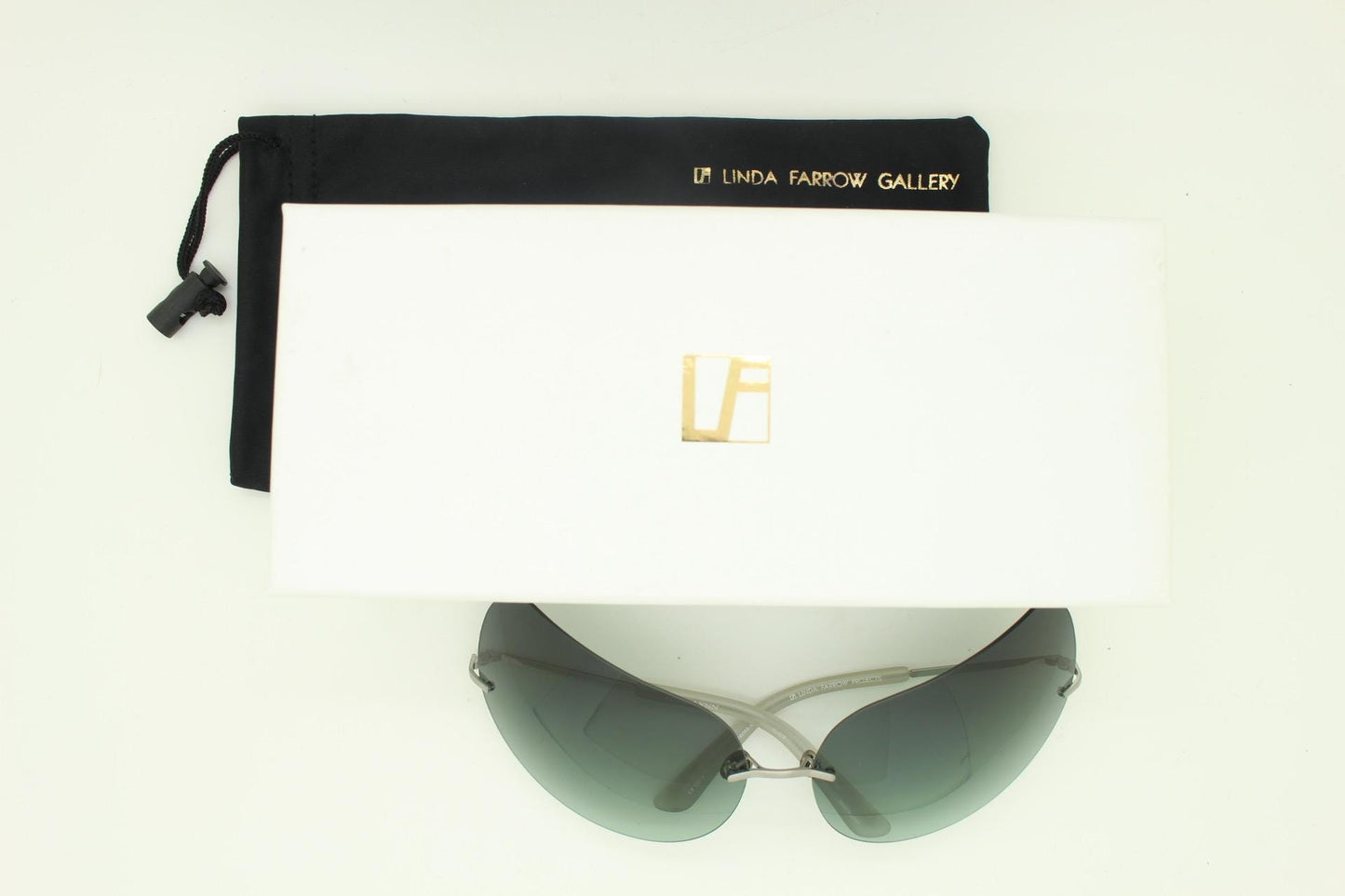 Linda Farrow cat eye sunglasses made in Japan by Todd Lynn. Massive frameless green cateye. Luxe Gallery Projects Vintage. NOS Full Set