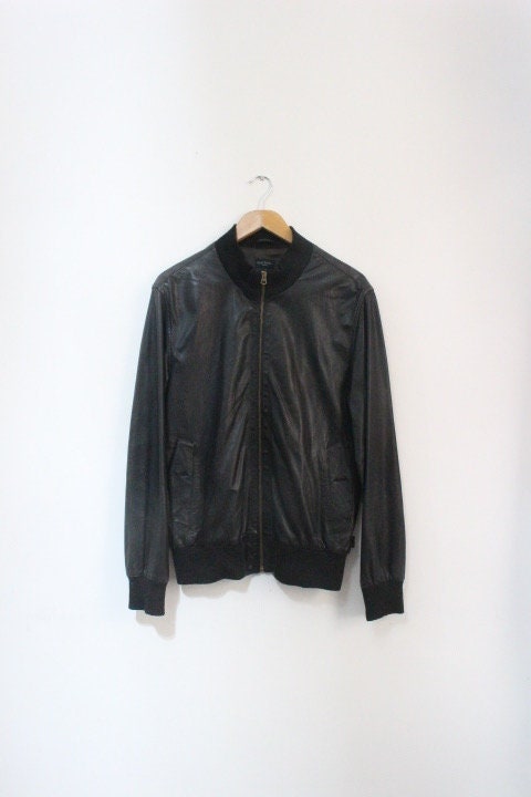 Paul Smith high collar bomber jacket. Plain black lambskin minimal flap pocket mens zipper. Ribbed collar. Size Medium