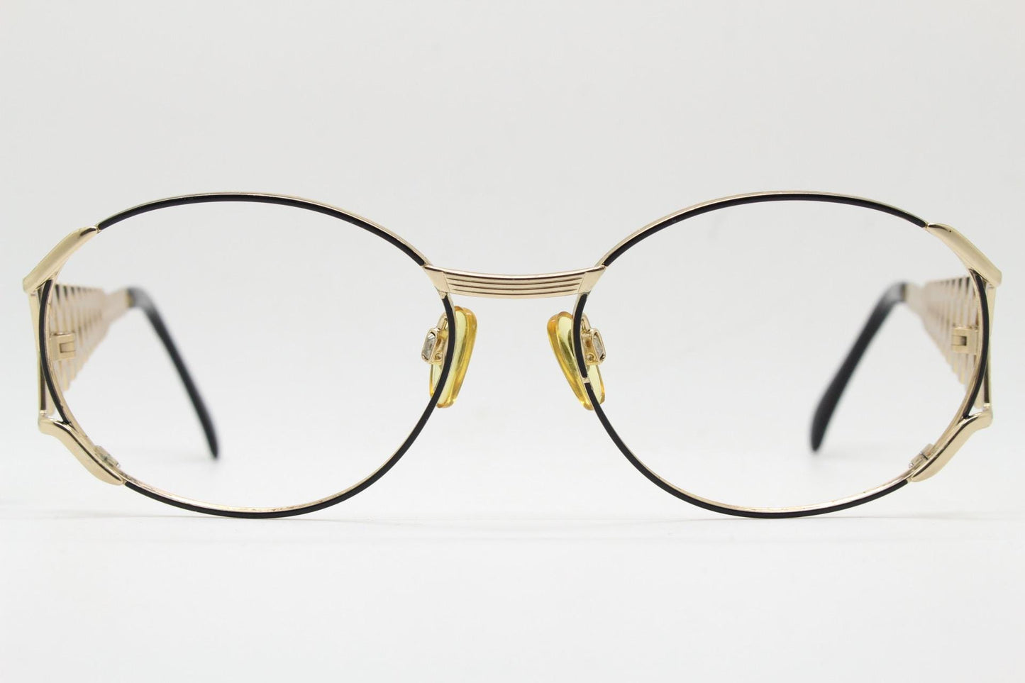 Yves Saint laurent 90s vintage large oval eye glasses made in Italy with incredible zig zag arm design. YSL Prescription RX spectacles