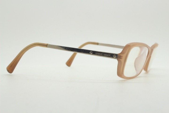Giorgio Armani eye glasses model 7011 made in Italy. Transparent beige acetate and gold arm optical frames. Prescription eyeglasses. RX