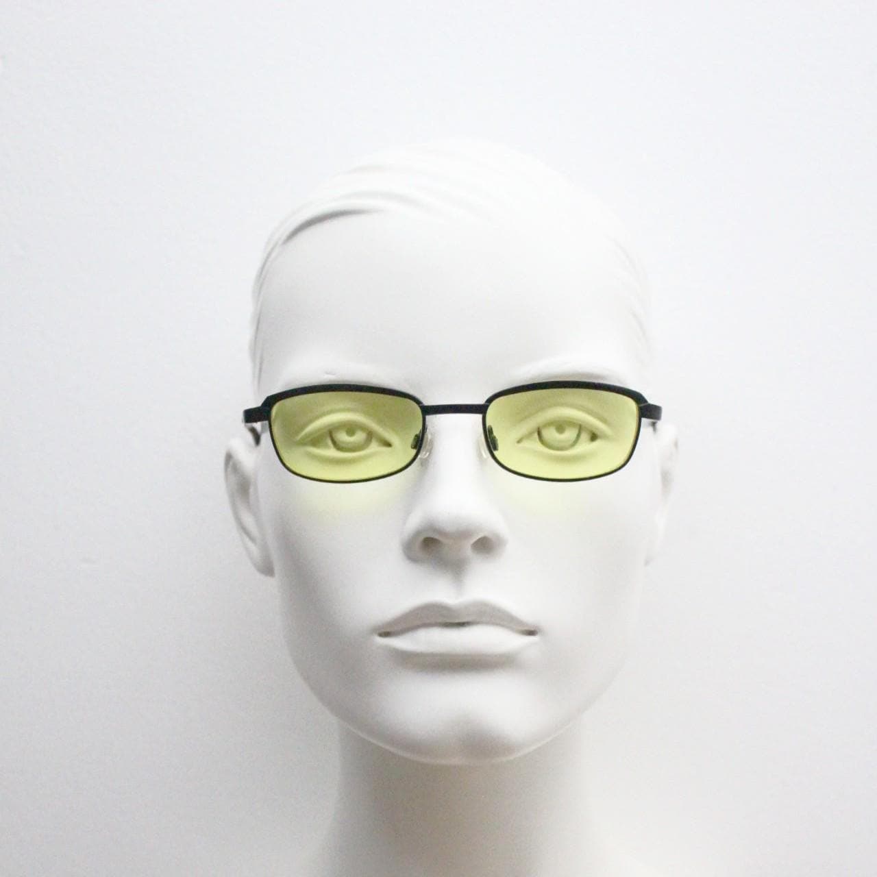 Vintage small rectangular sunglasses. Authentic quirky 90s design in a matt black solid metal frame with bright yellow lenses. 2000s. NOS