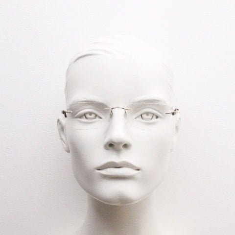 Silhouette rectangular frameless eye glasses model 7677 made in Austria. Minimal lightweight optical frame with golden trim. Prescription RX