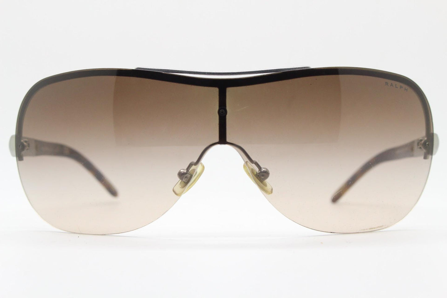 Ralph by Ralph Lauren Y2K vintage big shield sunglasses. 2000's curved wraparound mini mask with graduating mono lens. Aviator