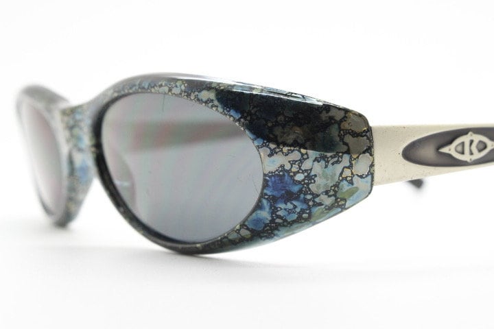 Killer Loop Shedevil 90s vintage shield sunglasses made in Italy. Low profile wrap around design with unique metallic print. One off sample