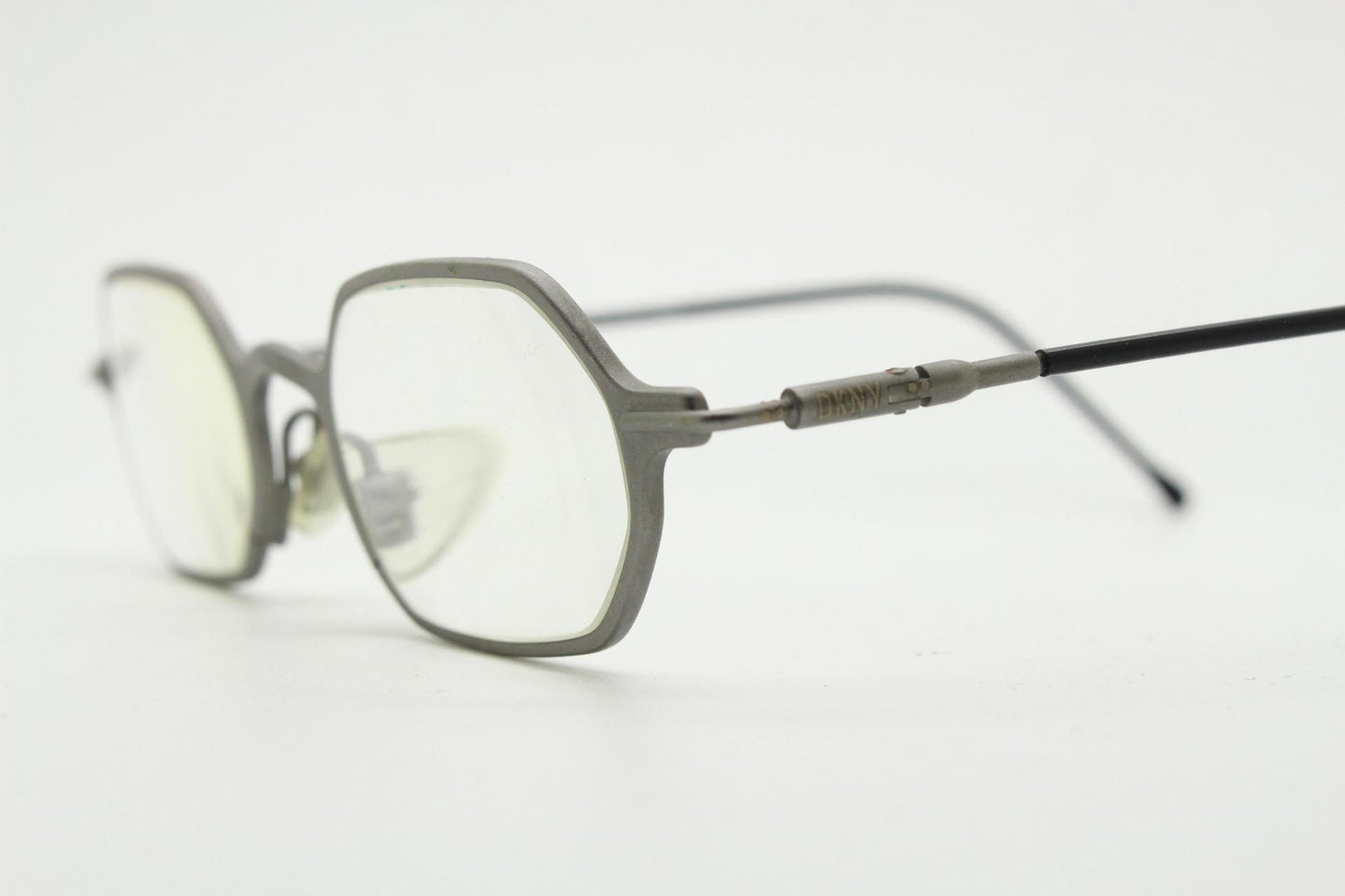 DKNY 90s vintage hexagon eye glasses made in Italy. Small matt grey optical frames. Prescription RX. Donna Karan. Victorian style steampunk