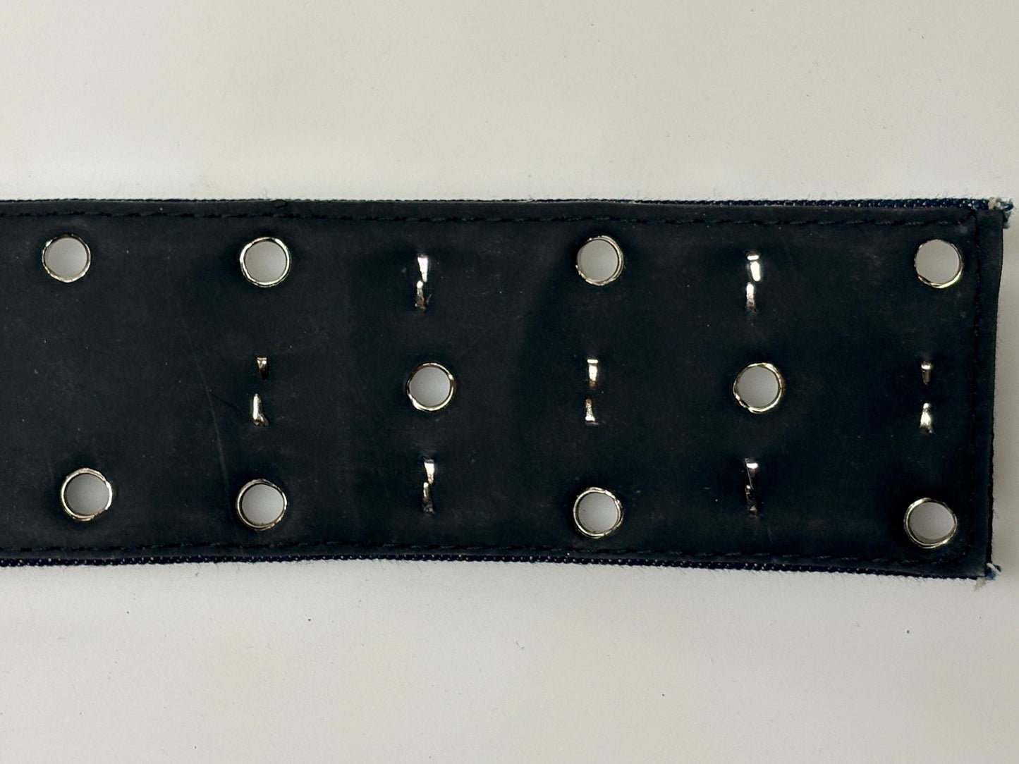 Y2k vintage tall blue denim belt with metal buckle and 3 rows of cool conical star studs and loops. Statement feature piece. 2000s NOS