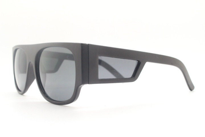 Y2K vintage rectangular side panel sunglasses. Black matt frame with grey lenses and side window spoilers / blinkers. 2000s NOS goggle