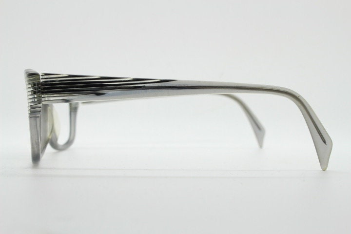 Alain Mikli rectangular eye glasses made in France. Dynamic black and white striped layered acetate grey optical frame. Prescription RX