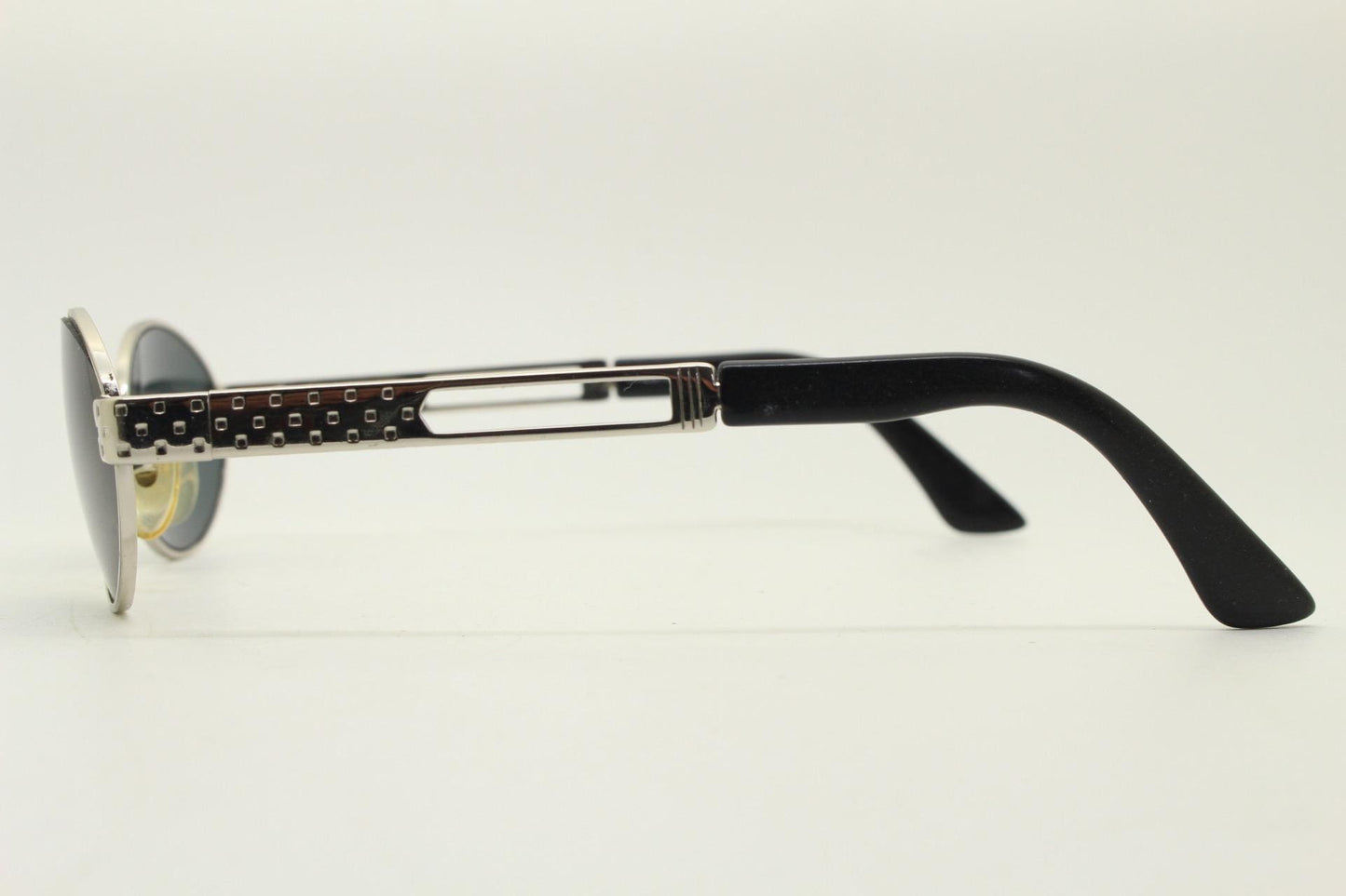 Prestige 90s vintage oval small bug eye sunglasses model 4028 made in Italy. Chrome finish solid metal frame with indented arm pattern. NOS