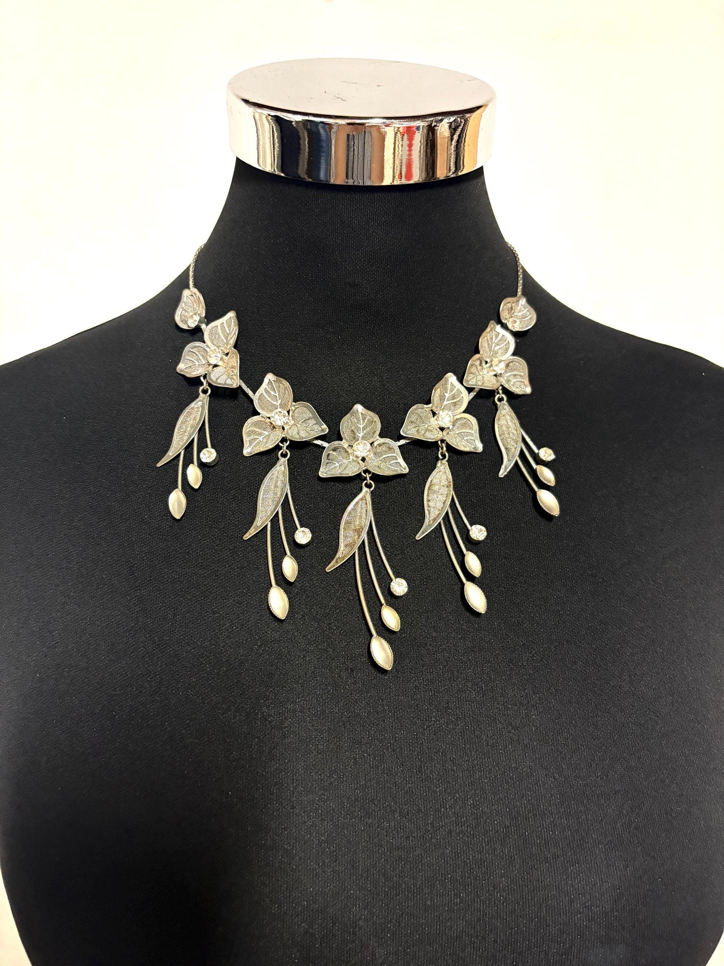 90s vintage extensive statement flower chain necklace. Full breasted array of mesh backed petals and dangling leaves with diamante centres