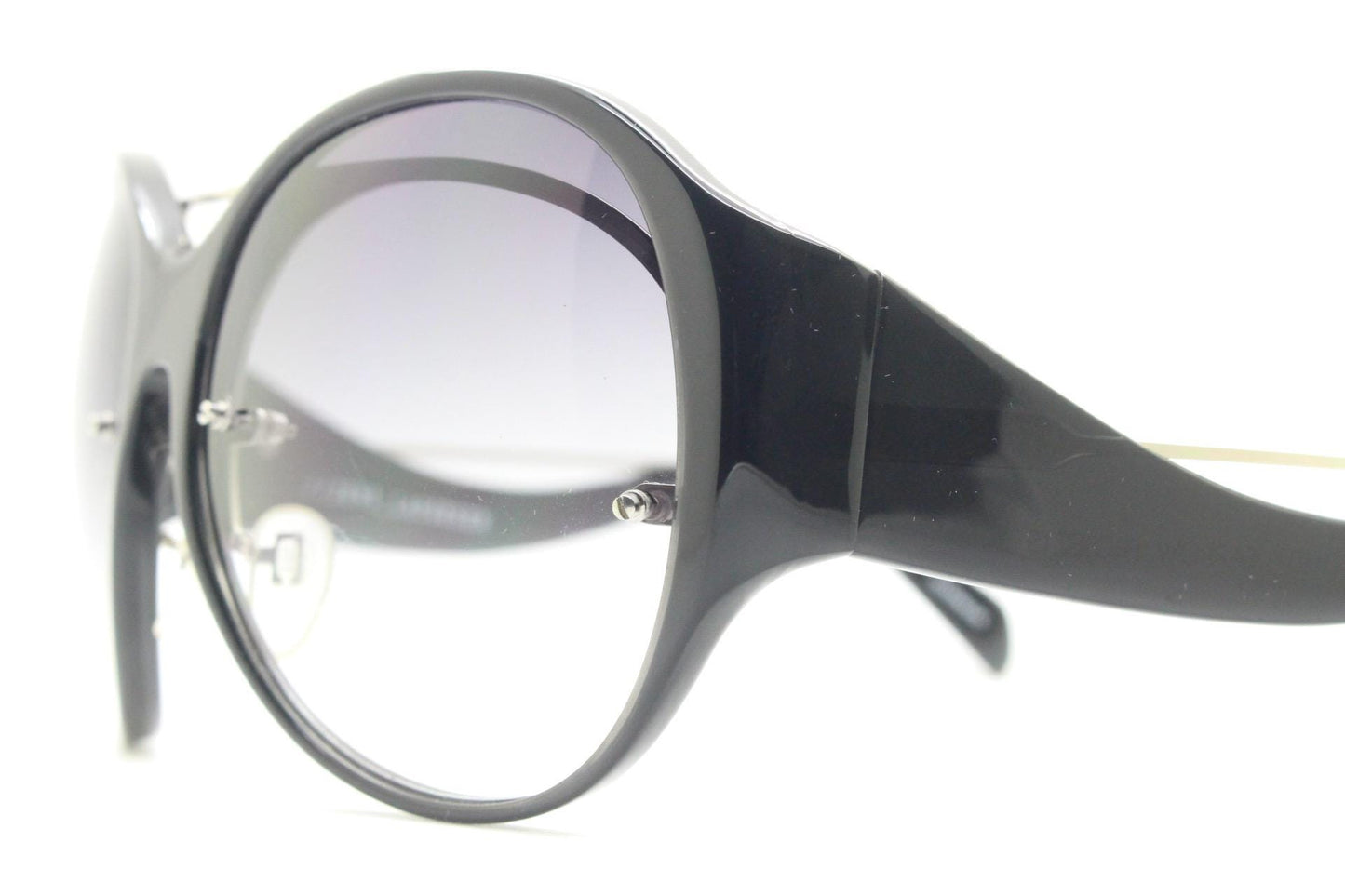 Jens Laugesen oversized sunglasses hand made by Linda Farrow. Black frame with undulating arms and smoky lenses. 70s design. Vintage. NOS