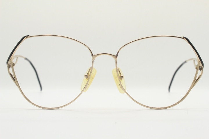 Viennaline 70s vintage angular round eye glasses. Slightly oversized subtle gold chrome optical frame with incredible arms. Prescription RX