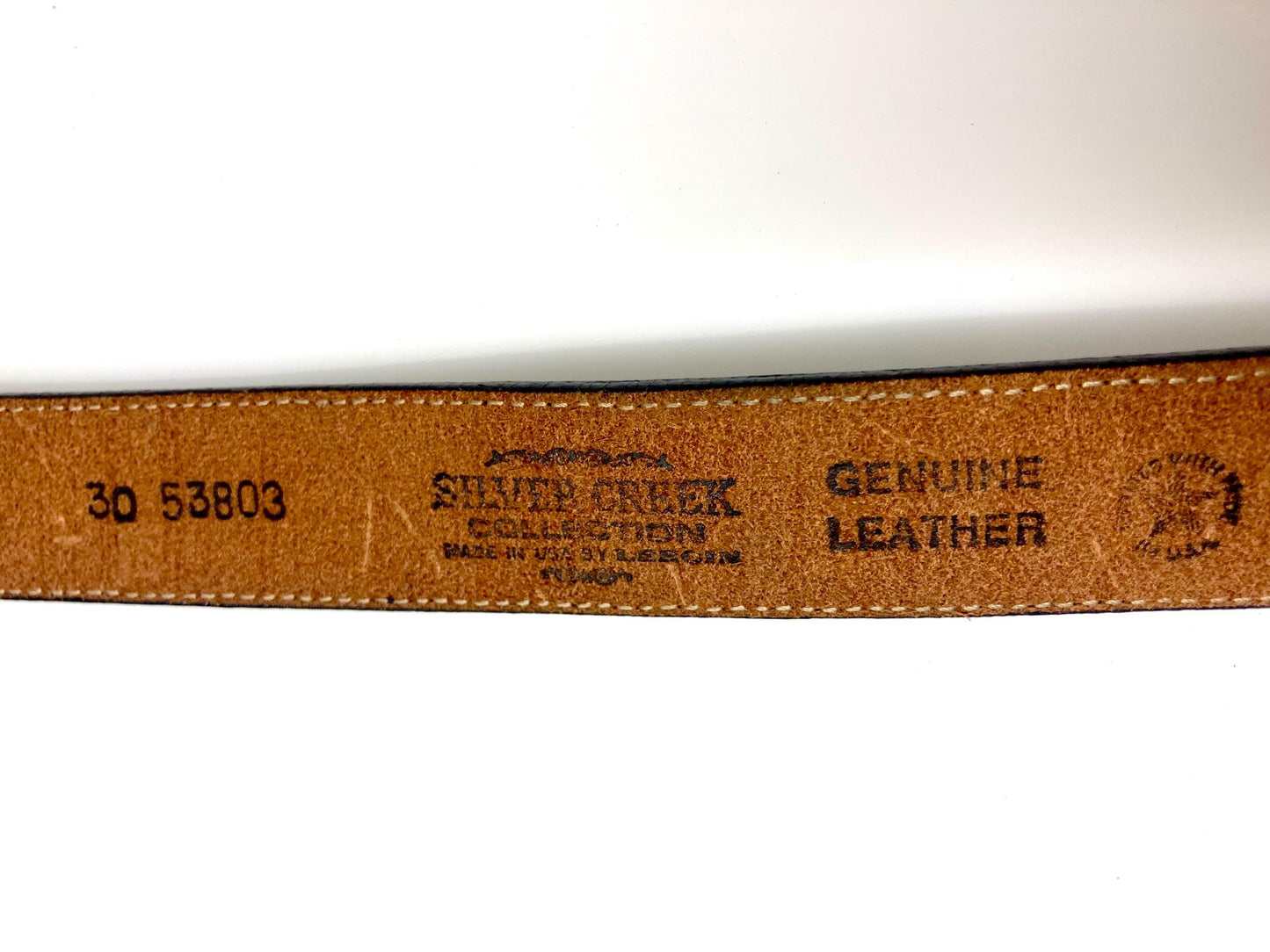 Leegin 80s vintage Silver Creek Collection Native American belt. Leather cutout overlay on tapestry backing. Changeable buckle. USA made NOS