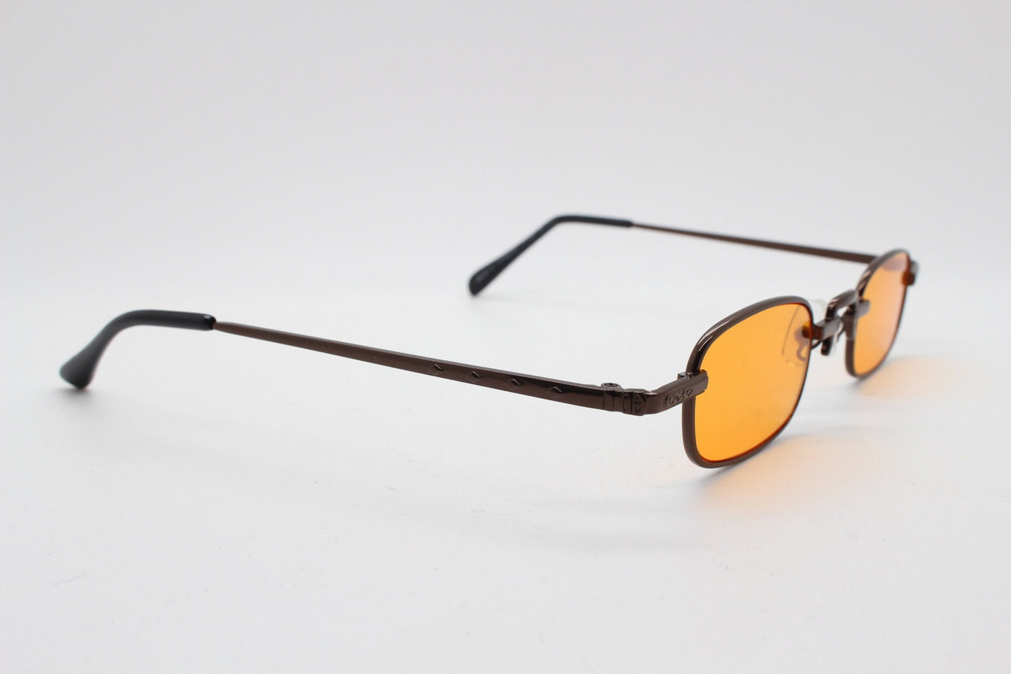 90s vintage small rectangular sunglasses. Imposing minimal bronze brown metal victorian style frame with orange lenses. Steampunk. BNWT
