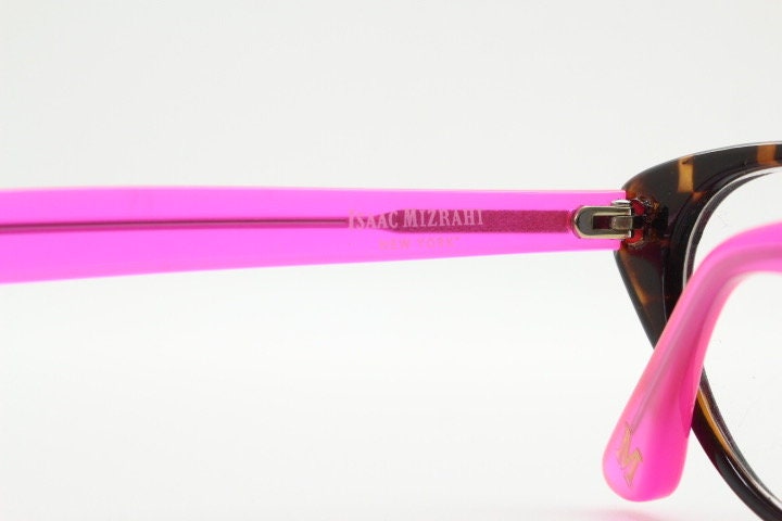 Isaac Mizrahi vintage cat eye glasses. Womens dark tortoise cateye optical frames with pink arms. Prescription eyeglasses. RX NOS spectacles