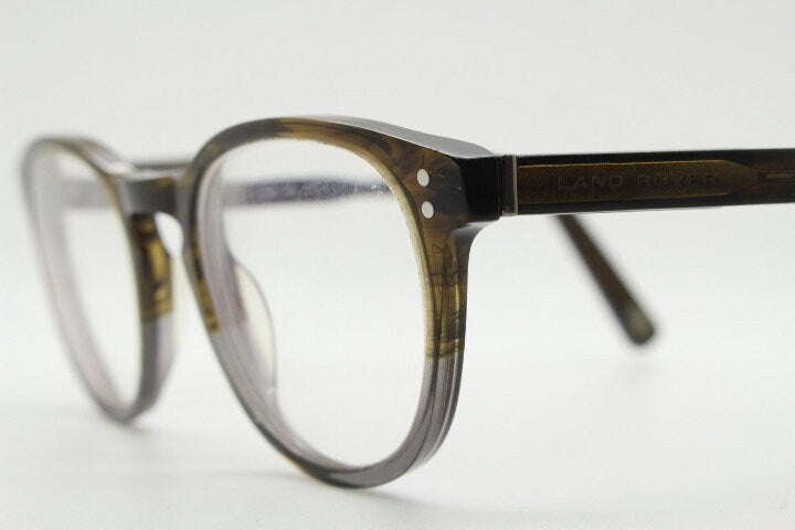 Land Rover vintage round 40s design eye glasses.Mottled brown and grey acetate optical frame with keyhole bridge. Prescription RX